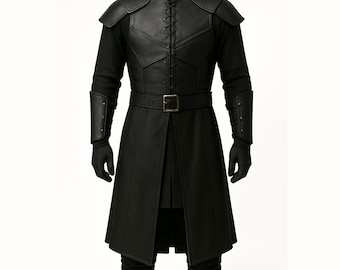 May include: Black leather-like coat with a high collar, shoulder pads, and a belt with a rectangular buckle. The coat has a lace-up front and long sleeves with gauntlets. The outfit includes black gloves and pants.