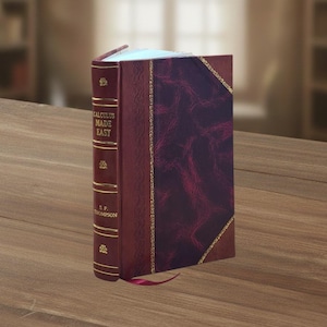 May include: A burgundy leather-bound book titled "Calculus Made Easy" by S.P. Thompson. The cover features gold detailing and a maroon interior. A red ribbon bookmark is present.