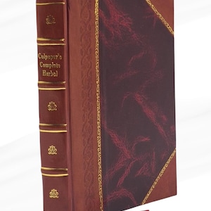 May include: A hardcover book with a burgundy leather cover and spine. The spine features gold lettering and decorative elements. The cover has a textured, dark red design with gold trim. The title "Culpeper's Complete Herbal" is visible.