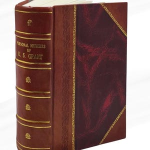 Puede incluir: Un libro de tapa dura titulado "Personal Memoirs of U.S. Grant". El libro tiene una cubierta de cuero marrón oscuro con detalles dorados y detalles en relieve. El lomo presenta letras doradas y bandas decorativas. Una cinta roja como marcador de libros es visible.