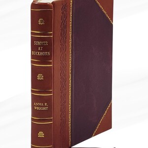 May include: A hardback book titled "Summer at Buckhorn" by Anna R. Wright. The book has a burgundy cover with a dark brown spine and gold detailing. A burgundy ribbon bookmark is visible.
