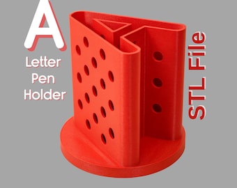 May include: A bright red letter and pen holder with the text "A Letter Pen Holder" and "STL File". The holder has a circular base and a triangular design with multiple holes for pens. The design is 3D printed.