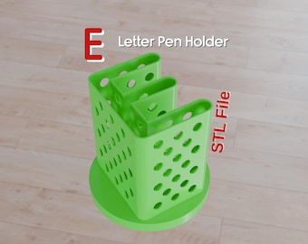 May include: A bright green letter-shaped pen holder with a round base. The pen holder has a perforated design and the text "Letter Pen Holder" and "STL File" are visible.