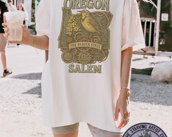 ヴィンテージ スチームパンク オレゴン T シャツ: 州の鳥と花のグラフィック T シャツ