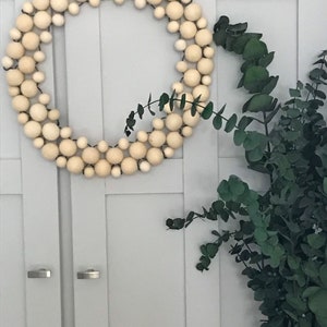 Solid, round, wood bead wreath 13 Inches