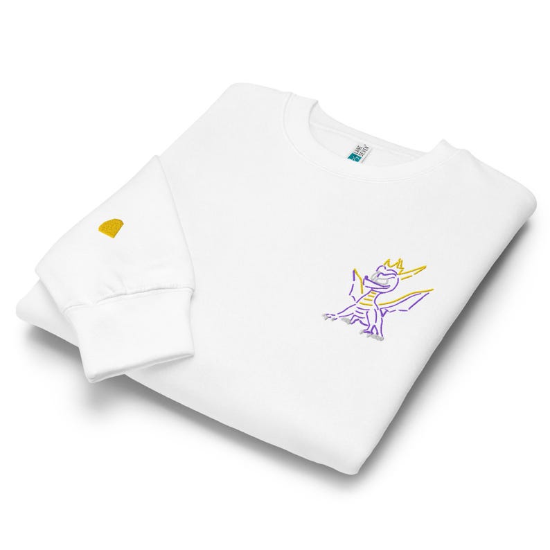 Unisex premium crew neck sweatshirt. Spyro the dragon embroidery on the left chest, gem on the right wrist.