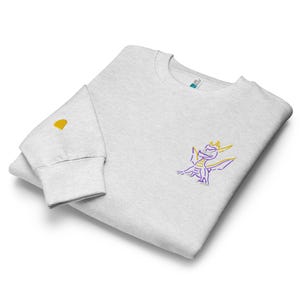 Unisex premium crew neck sweatshirt. Spyro the dragon embroidery on the left chest, gem on the right wrist.