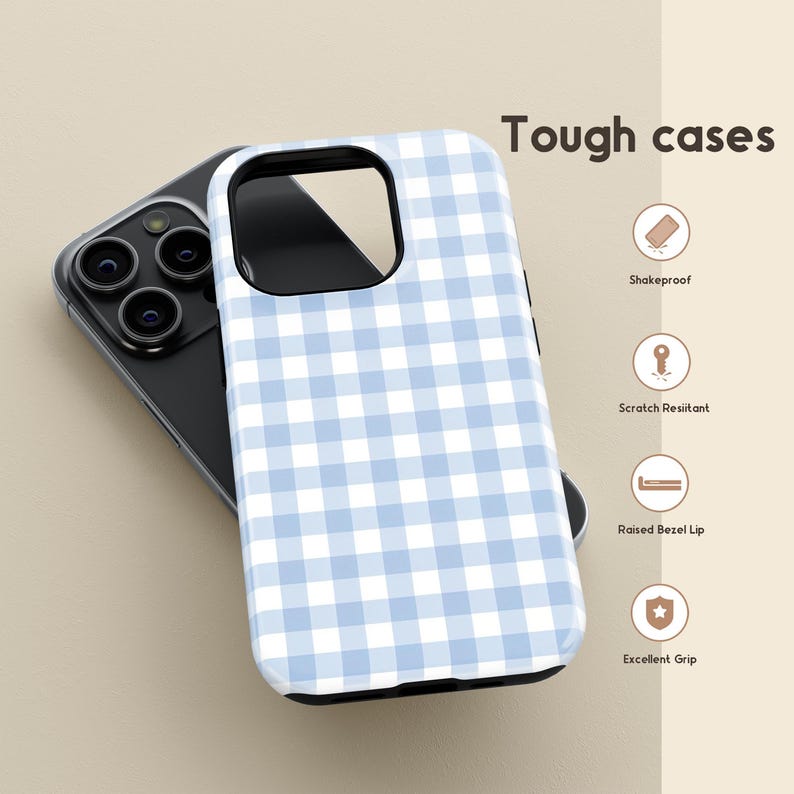 May include: A light blue and white gingham patterned phone case. The case is on top of a black phone. The words "Tough cases" are in the upper right corner. The case is shake proof, scratch resistant, has a raised bezel lip, and excellent grip.