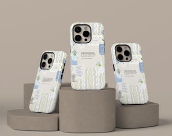 May include: Three phone cases with a floral and lace design. The cases feature a quote and floral illustrations in blue and white. The cases are displayed on a neutral background, showcasing the design and text.