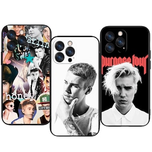 May include: Three phone cases with images of a celebrity. One case has a collage of photos, another a black and white portrait, and the third has a black background with the words "Purpose Tour".
