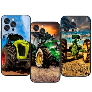 May include: Three phone cases featuring tractor designs. The first case displays a yellow and black tractor against a blue sky. The second case shows a green tractor in a field at sunset. The third case depicts a green tractor on a dirt road.