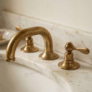Gooseneck Widespread Bathroom Faucet with Lever Handles – Unlacquered Brass