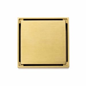 May include: Square brass drain cover with a brushed finish. The cover has a recessed square design and a thin black border. The brass has a warm, golden hue, and the overall design is modern and minimalist.