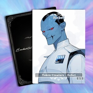 May include: A collectible card featuring a blue-skinned character with red eyes, wearing a white uniform with black accents. The card is labeled "Rebel" and "Token Creature - Rebel 2/2". The back of the card is black with the word "Enchanted".