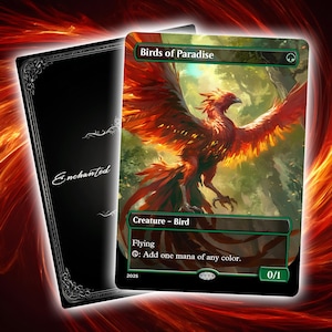 May include: A fantasy card featuring a vibrant red and orange phoenix with outstretched wings, titled "Birds of Paradise." The card includes text indicating it's a creature-bird with flying abilities and mana-generating capabilities. A black card with the word "Enchanted" is visible.
