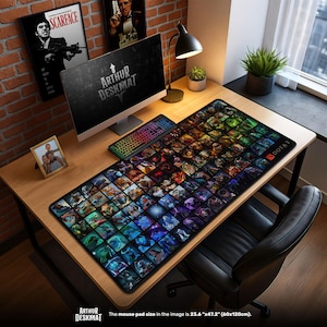 May include: A large rectangular mouse pad featuring a colorful grid of video game character illustrations. The pad, measuring 23.6" x 47.2", is placed on a wooden desk with a computer, keyboard, and other accessories. The text "ARTHUR DESKMAT" is visible.