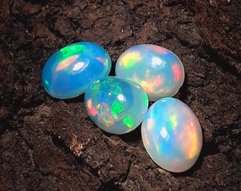 Ethiopische opaalcabochon: neutraal vuuropaal voor het maken van sieraden (8 x 6 mm, 3,20 karaat)