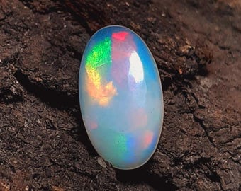 Ethiopische opaalcabochon: AAA ovale edelsteen, 12 x 7 mm