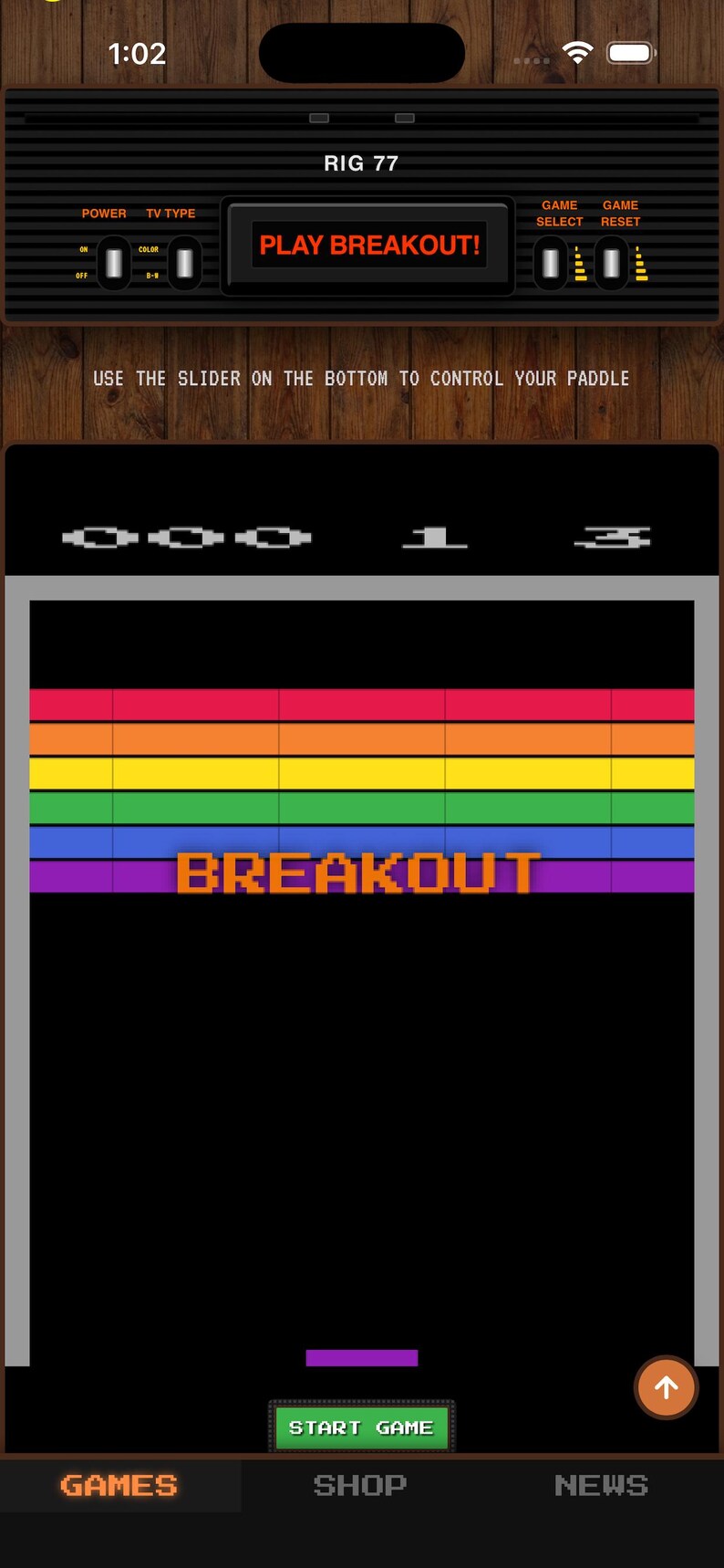 Puede incluir: Una pantalla de tel&eacute;fono m&oacute;vil muestra una interfaz de videojuego retro. El juego es "Breakout", con una fila superior de bloques de colores del arco&iacute;ris. La pantalla muestra el t&iacute;tulo del juego y un bot&oacute;n para comenzar.