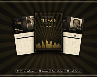 May include: A 2027 wall calendar featuring a black and gold art deco design with a city skyline graphic. The cover displays the text THE MOB CALENDAR 2027. Two open pages show monthly grids, historical photographs of individuals, and biographical text.