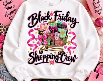 Könnte beinhalten: Ein weißes Sweatshirt mit Rundhalsausschnitt und einer Grafik eines goldenen Einkaufswagens, der mit bunten Geschenktüten und einem Kaffeebecher gefüllt ist. Der Text lautet Black Friday Shopping Crew, umgeben von rosa Schleifen, goldenen Sternen und kleinen Herzen.