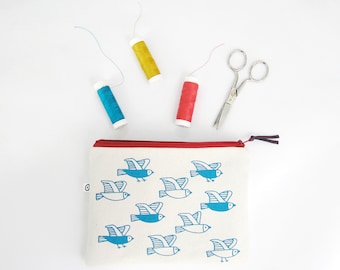 Cosmetic pouch with birds print. Useful cotton makeup bag or pencil case with zipper closure, screenprinted in blue, matching the lining.