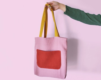 Large bag with useful pocket. Large handbag made of colorful cotton fabrics with wafle texture and bright color palette. Shopping bag pink.