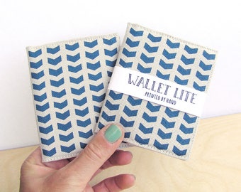 Men's thin wallet in blue for going out, made of hand screen printed cotton by Olula. No bulk in your pocket!