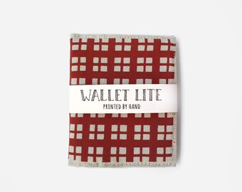 Red thin wallet for men with zipper pocket for change, made of hand printed cotton. Keep notes, cards and coins together in one slim wallet.