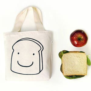 Canvas lunch bag for kids. Reusable sandwich bag. Fun snack bags for kids and adults by Olula image 1