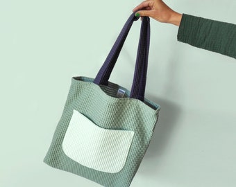 Summer tote bag with useful pocket. Large handbag made of colorful cotton fabrics with wafle texture. Play shopping bag green.