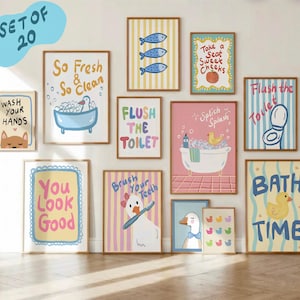 May include: A collection of 10 framed bathroom-themed art prints. The prints feature whimsical illustrations and text, including phrases like "Wash Your Hands," "So Fresh & So Clean," and "Bath Time." The color palette includes pastels, with ducks, fish, and other playful elements.