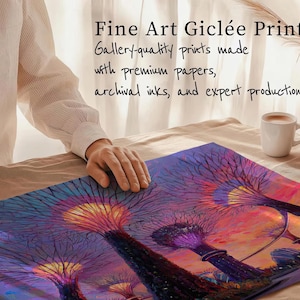 a person's hand resting on a colorful painting depicting a surreal, fantastical landscape with trees and other elements.