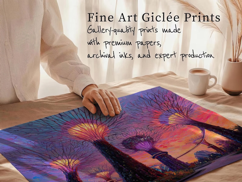 a person's hand resting on a colorful painting depicting a surreal, fantastical landscape with trees and other elements.