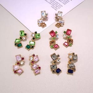 Oscar de la Renta earrings - gold star flower pearl