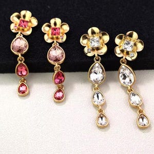 Oscar de la Renta earrings - gold star flower pearl