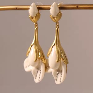 Oscar de la Renta earrings - gold flower pearl