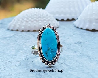 Turquoise sterlingzilveren ring Kingman: ovale edelsteen