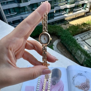 Elegant Vintage Style Oval Dial Women’s Watch – Stainless Steel Strap, Minimalist Design, Gift for Her