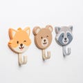 Animal Face Kids Wall Hooks: 3 Self-Adhesive Bathroom Towel Hooks - Bear, Raccoon, Fox product logo