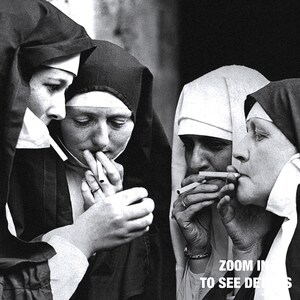 a group of women standing next to each other