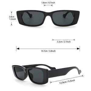 May include: Black rectangular sunglasses with dark lenses. The frame measures 5.8 inches wide, 1.3 inches high, and 5.5 inches long. The lenses are 2.1 inches wide. The bridge is 0.7 inches wide.
