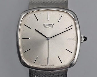 Vintage 1980 Seiko Quartz 8223-5120 33mm Silver Dial Day-date