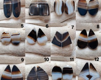 Atractivo par de piedras preciosas con bandas negras, 100 % ágata natural, par de cabujones con bandas negras combinados, grado AAA, hecho a mano, pulido, para uso como aretes, joyería.