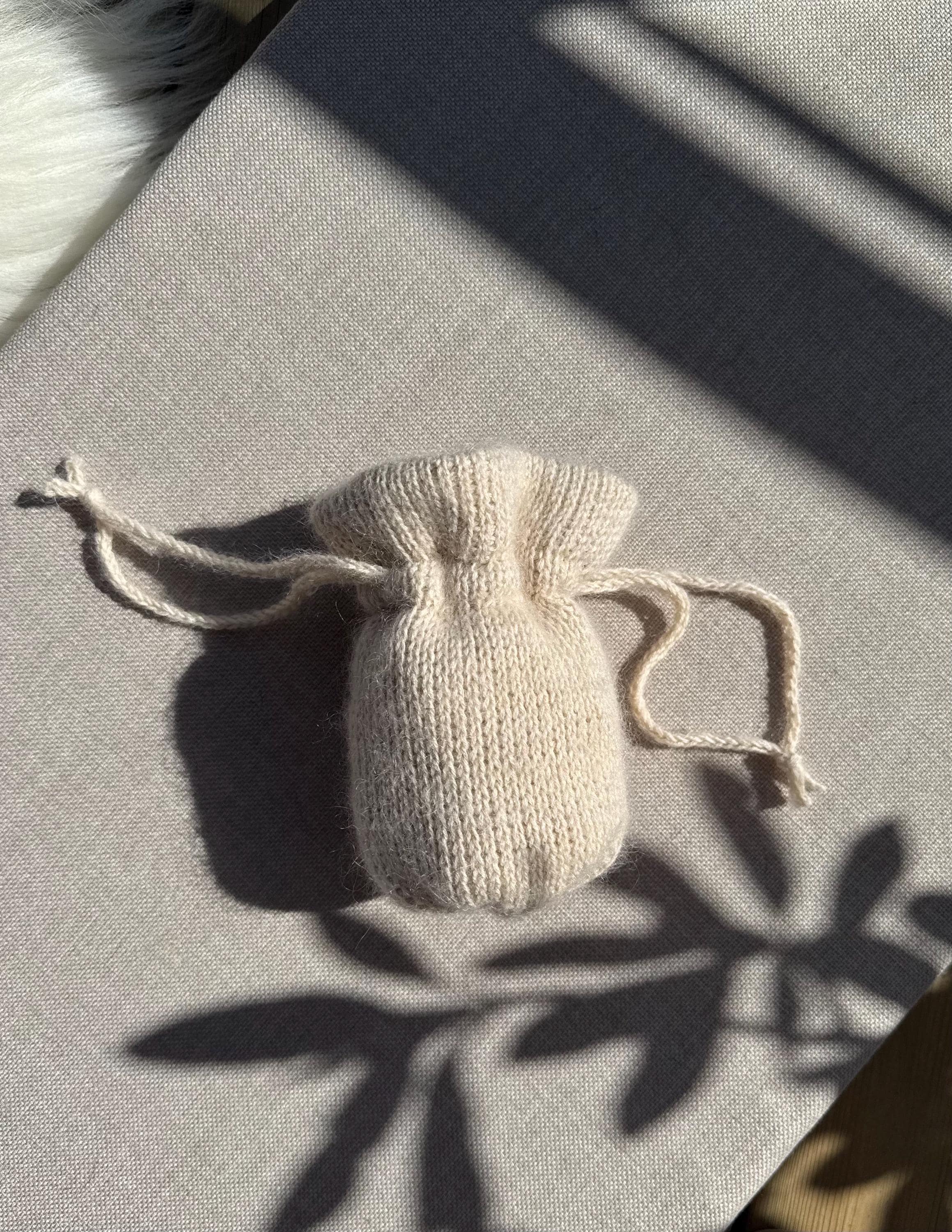 38 Mohair Crochet Patterns for Luxurious Layers, Accessories, and Cozy Home Projects 13 Mohair Drawstring Pouch