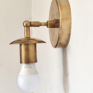 1 brass wall sconce light , bathroom light , modern raw brass light adjustable light , by - handicraft light