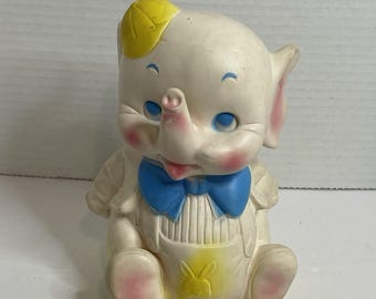 Elefante de juguete antiguo Edward Mobley con sonido, de 1960, amarillo y azul. De Arrow Rubber.