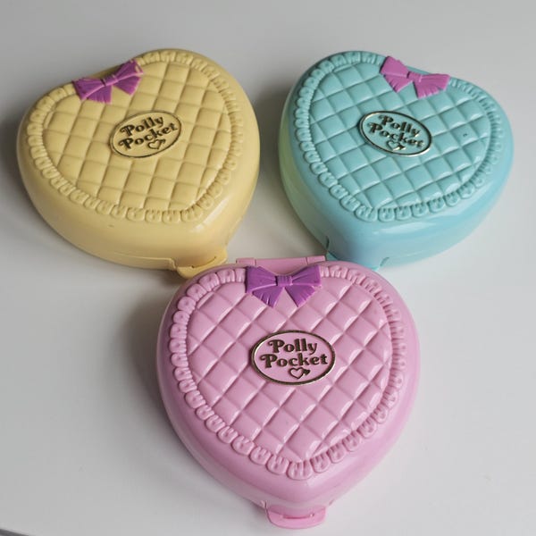Polly Pocket vintage con forma de corazón. Elige tu propio pájaro azul. 1994