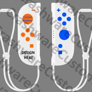 May include: White game controller with orange and blue buttons. The left controller has orange buttons and the text "Custom Buttons" and "Design Here". The right controller has blue buttons. Both controllers have white straps.