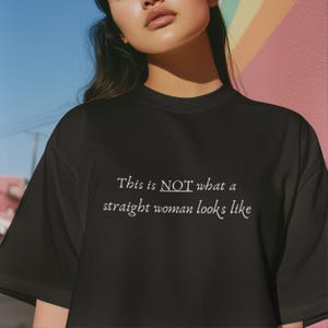 Funny lesbian t-shirt, this is not what a straight woman looks like shirt, wlw pride top, queer sapphic fashion clothing, lgbt graphic tee